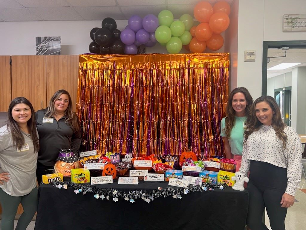  PTO members with candy bar